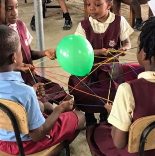 Nigeria Children learning the Web of Support.jpg