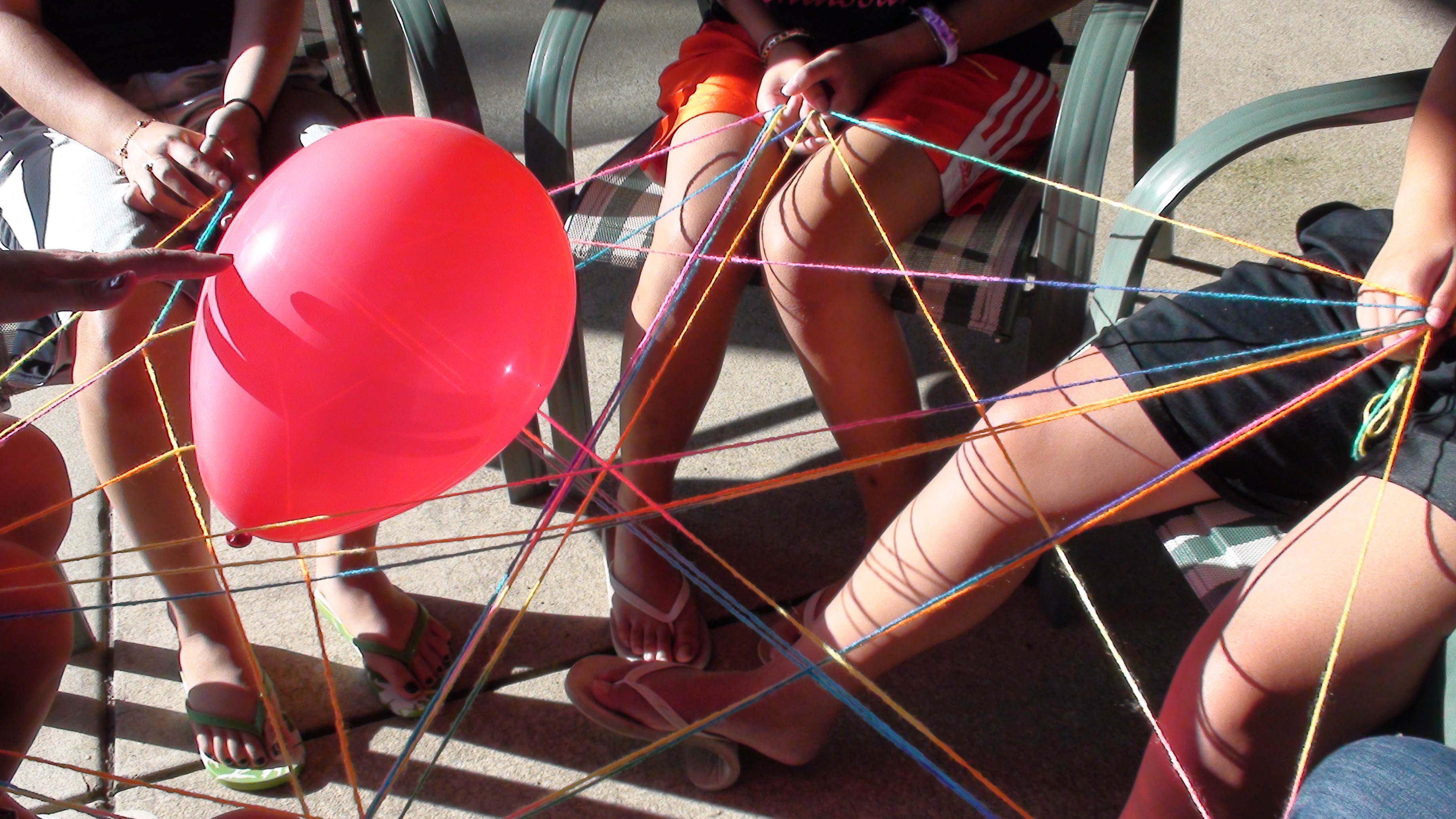 Youth learning the story of the Web of Support.